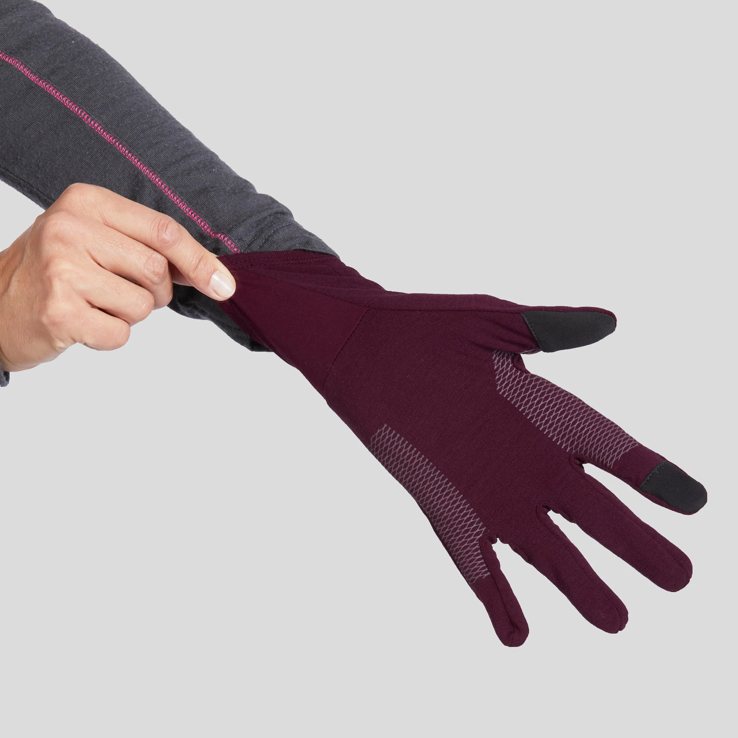 Hiking gloves made of merino wool for adults Forclaz MT500, dark burgundy